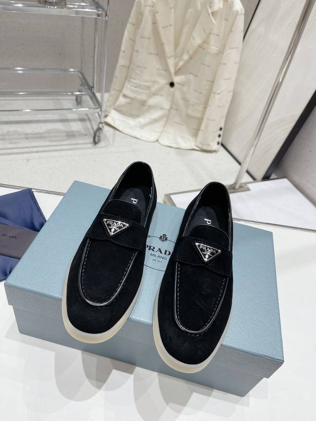 Prada half-slippers. Prada's latest loafers, the popular half-slipper series, em