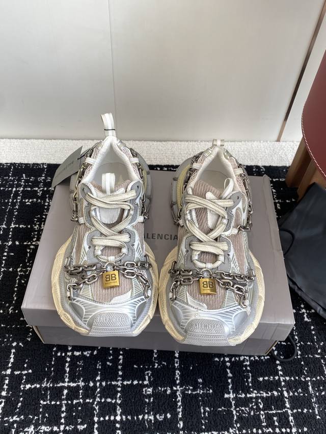 Balenciaga's flashy 3Xl chain-lock toe sneakers continue the trend of running sh