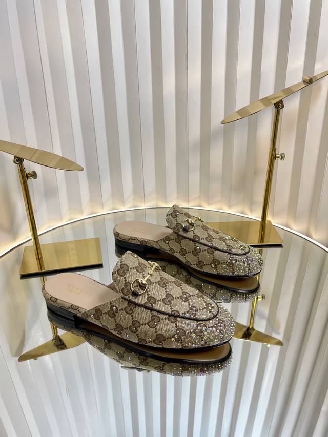 Gucci Jordaan women's slip-on shoe, meticulously embellished with dazzling facet