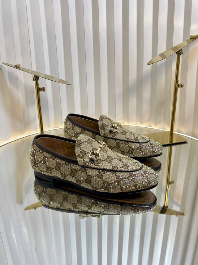 Gucci Jordaan Women's Loafer 2, meticulously embellished with dazzling faceted c