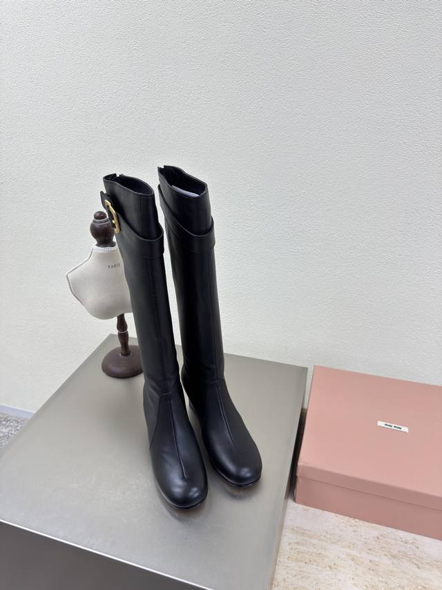 Miu'miu 25 Aw over-the-knee boots in lambskin with a rounded toe and square heel