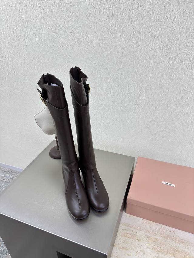 Miu'miu 25 Aw over-the-knee boots in lambskin with a rounded toe and square heel