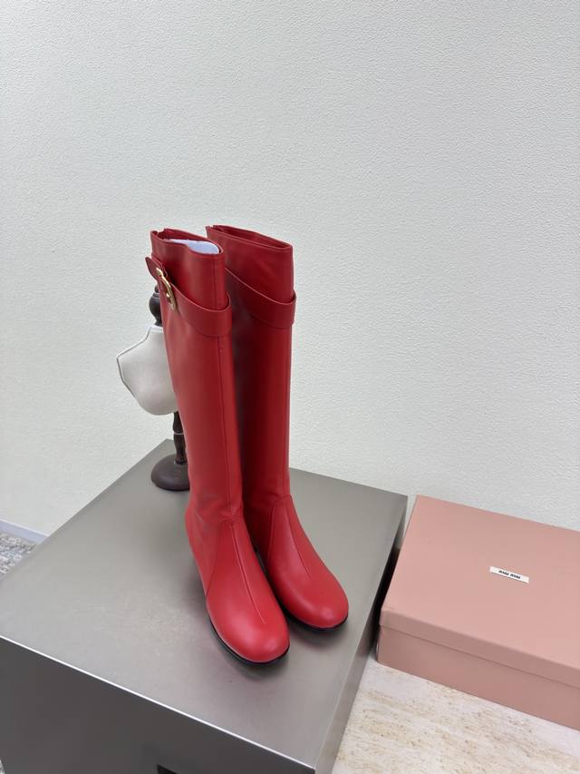 Miu'miu 25 Aw over-the-knee boots in lambskin with a rounded toe and square heel