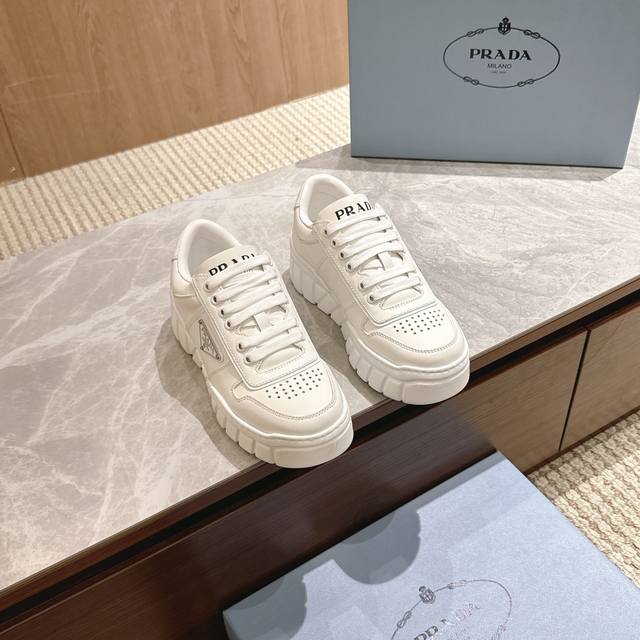 Prada 24 Fall/Winter New Thick-Sole White Sneakers for Couples. These Prada snea