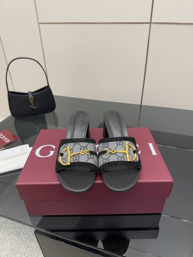 Summer's newest D-shaped, light gold horsebit buckle thong sandals. These women'