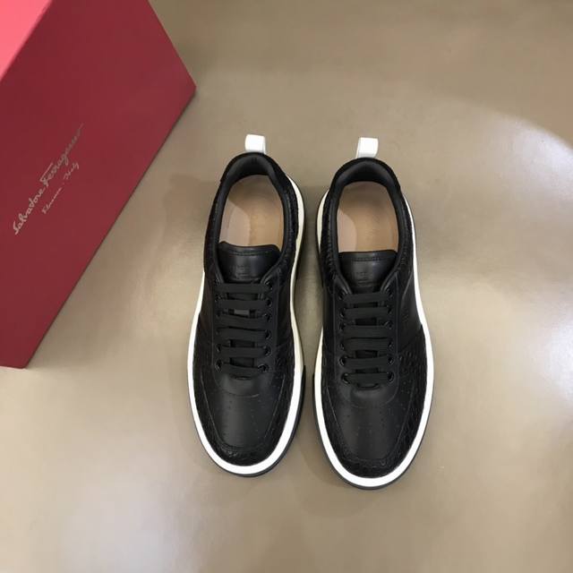 Salvatore Ferraga** men's low-top fashion sneakers. Crafted from soft calfskin,