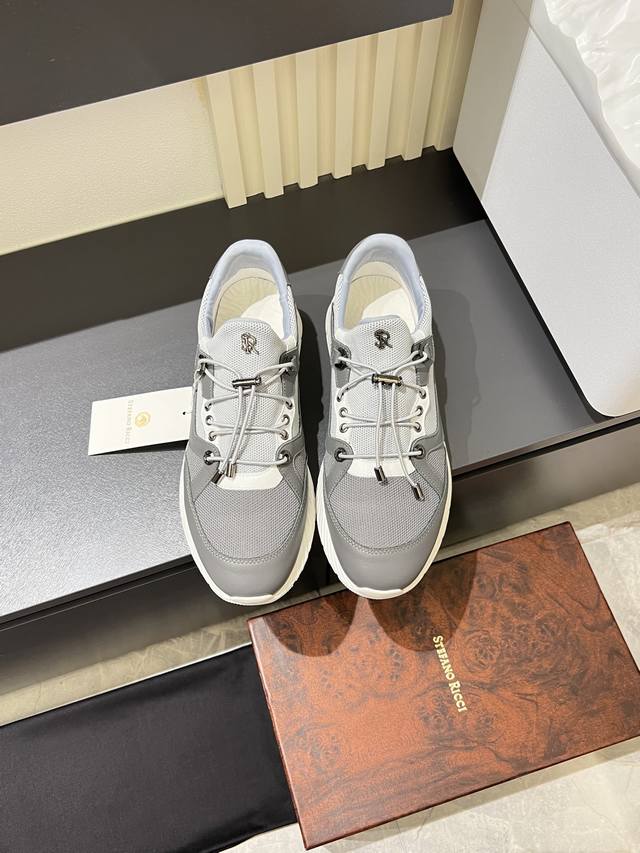 Stefano Ricci, a high-end luxury brand, offers men's casual sneakers made from g