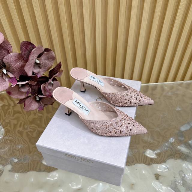 high-top Jimmy Choo pointed-toe kitten-heeled mules are the perfect companion to