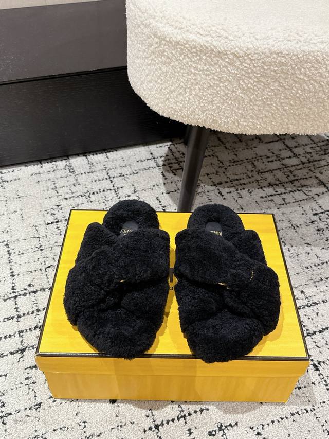 Fendi's new fall/winter lambswool slippers are visually adorable and warm, perfe