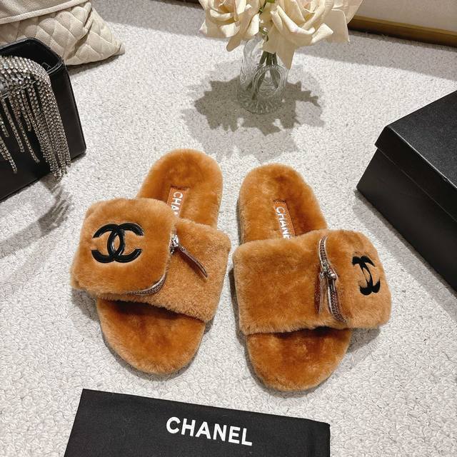 the factory's top-tier version of Chanel's new wool slippers. A must-have for la