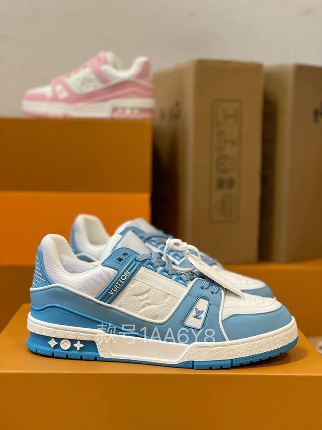 the top-of-the-line Louis Vuitton Lvtrainer sneaker, a couple's pair from the Vi