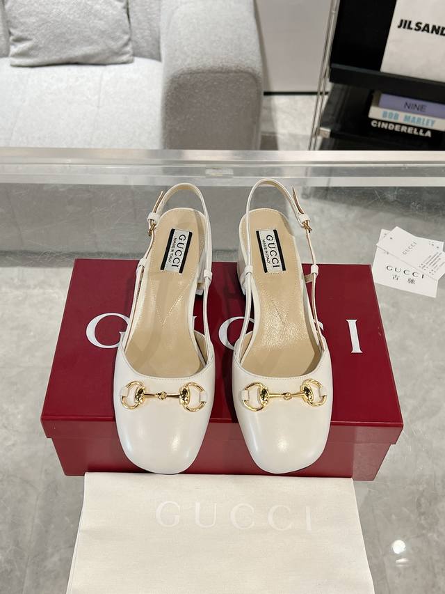 Gucci Women's Horsebit Strappy Sandals. Crafted from premium cowhide, these pump