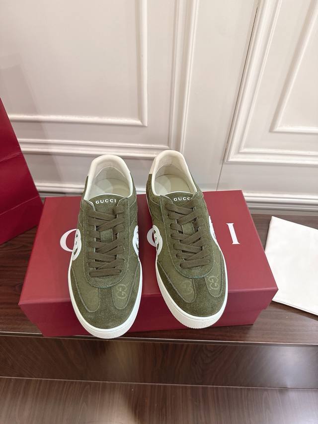 Men's Gucci Double G Casual Shoes. Crafted from soft suede, these shoes exude a