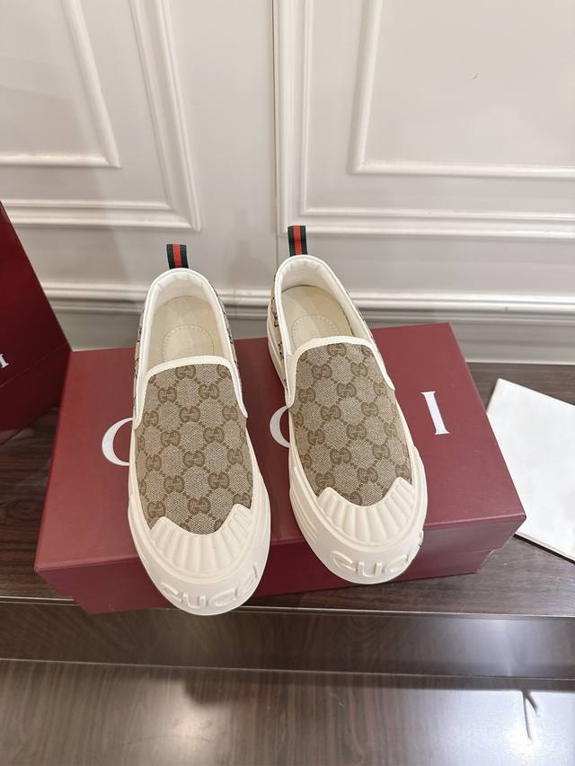 Women's Gucci Gg Canvas Shoes. Crafted from iconic Gg canvas, these sneakers com