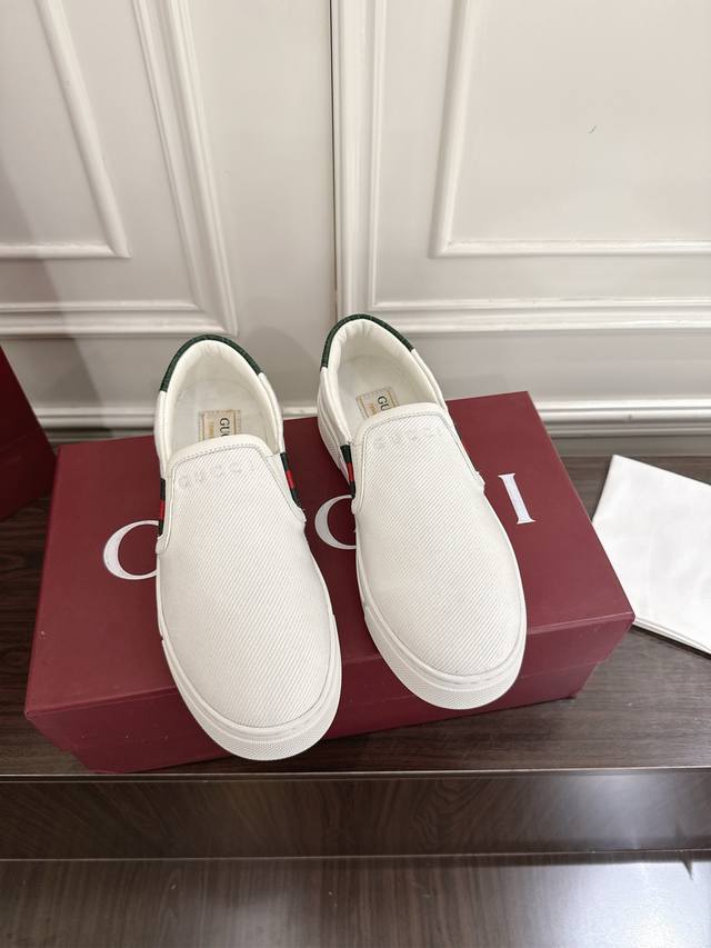 Gucci Ace men's slip-on shoes. Since their debut, the Ace sneaker has become a c