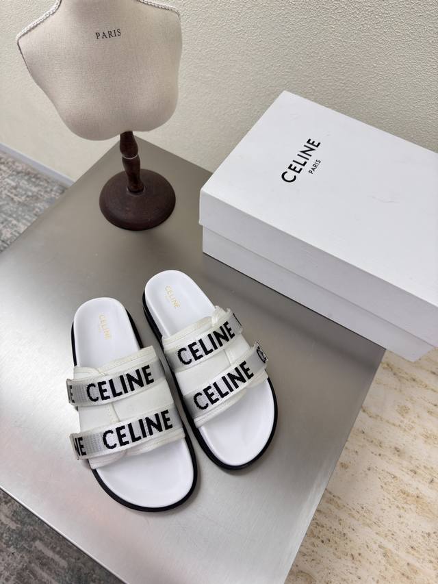 Thick-soled, double-layered webbing logo slippers. Celine's exclusive summer Arc