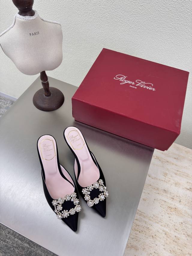 classic pointed-toe slippers with square diamond buckles. Made of classic, high-