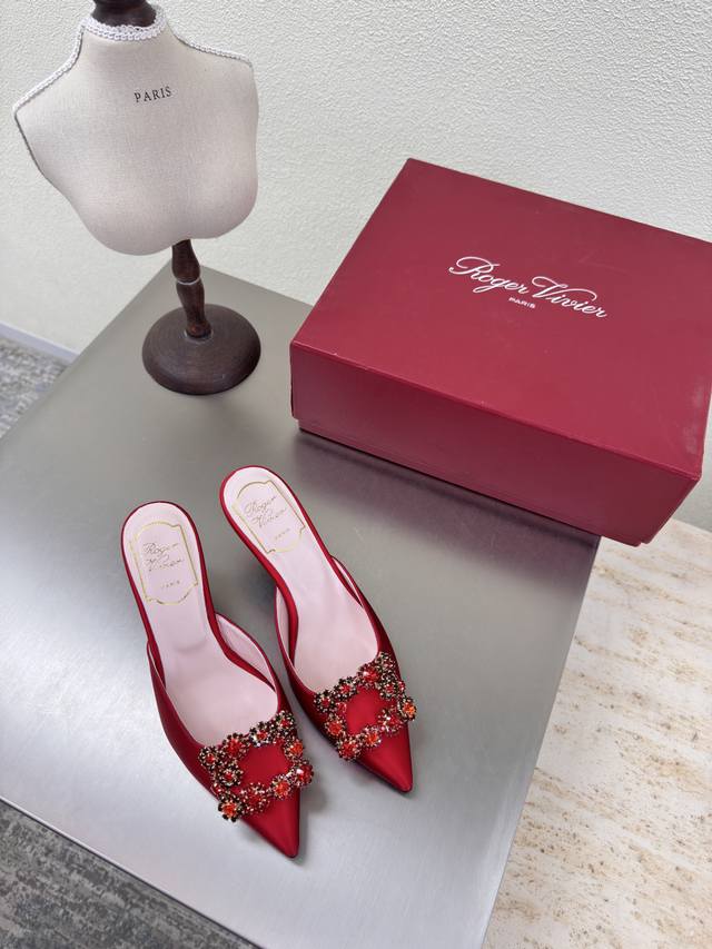 classic pointed-toe slippers with square diamond buckles. Made of classic, high-