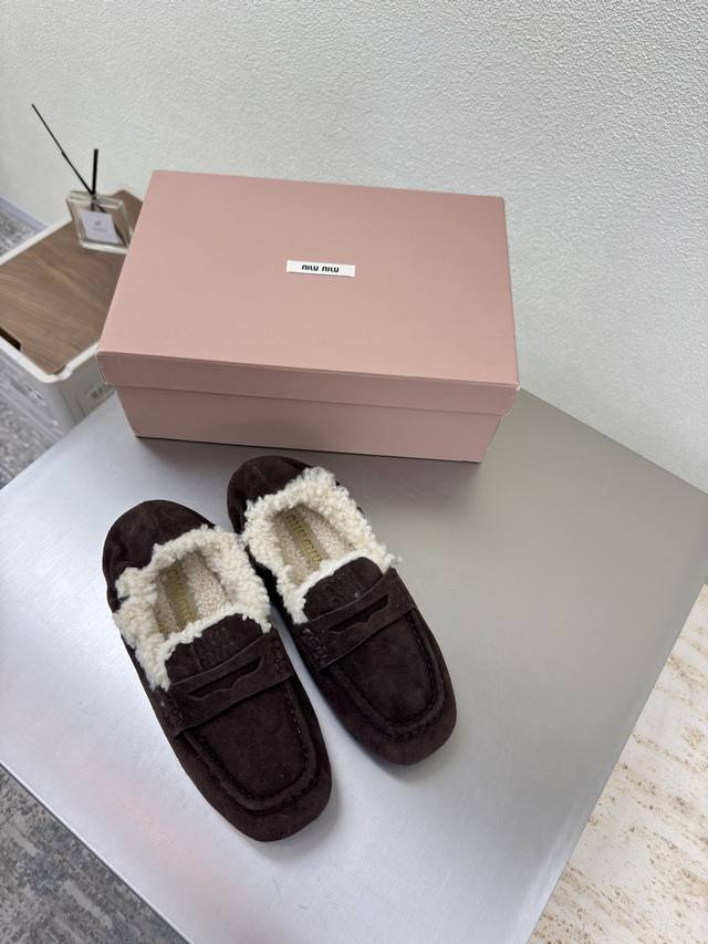 Australian wool-lined loafers from the Miu'miu 25 autumn collection. Dark coffee
