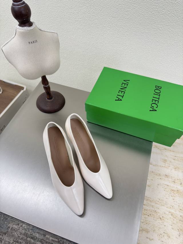 Bv Women's Sofia Deep-Cut Heels in White Calfskin. A high-end, round-toed design