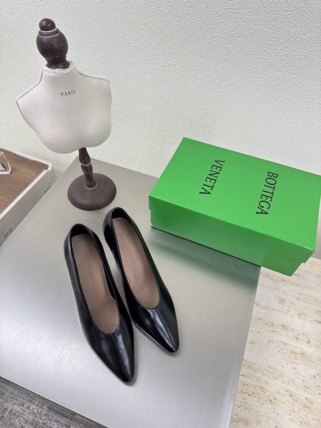 Bv Women's Sofia Deep-Cut Heels in Black Calfskin Leather. A high-end, round-toe
