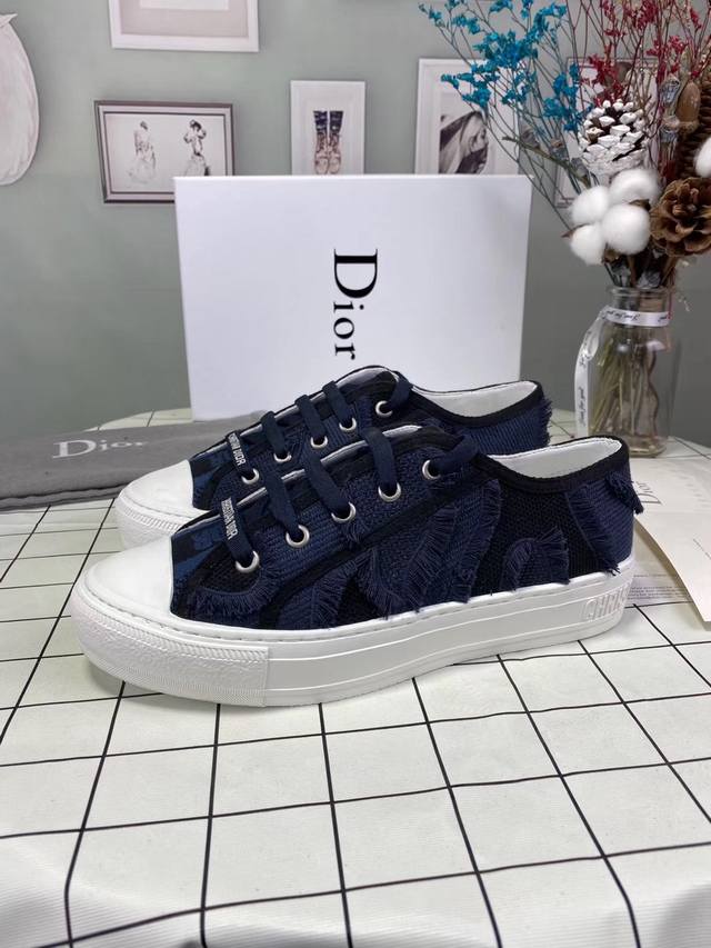Dior's new spring/summer collection, featuring embroidered canvas shoes, is a ho