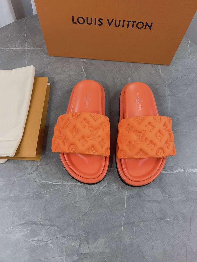 Lv's popular embossed logo sandals. These Pool Pillow Comfort flat sandals are c