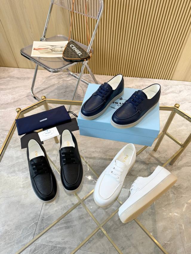 Actual Price: Prada Women's Lane Deer Leather Sneakers with Metal Logo. These s