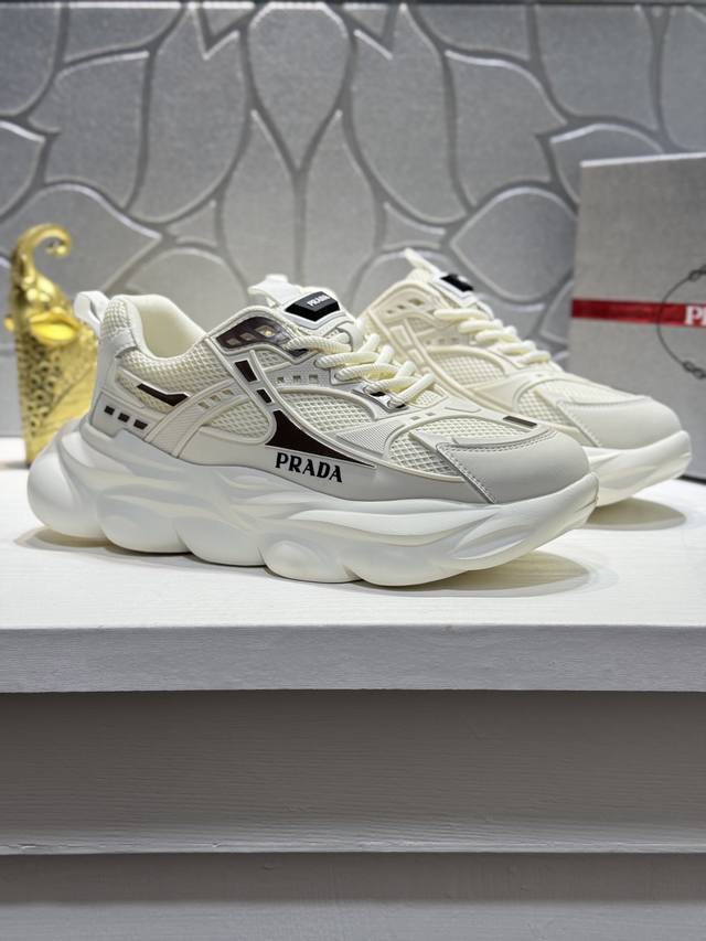 Prada! This world-first shoe features a cowhide upper with a mesh lining for enh