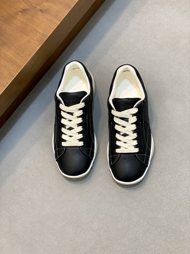 Prada's new men's patchwork casual sneakers DDD. These sneakers feature a unique