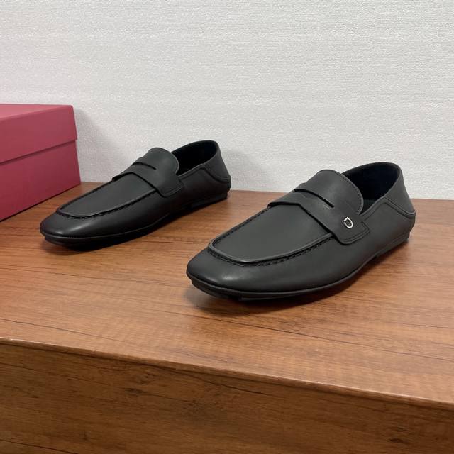 Ferragamo Hug Buckle Loafers These loafers feature a treaded heel for easy on an