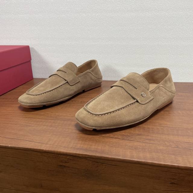 Ferragamo Hug Buckle Loafers These loafers feature a treaded heel design, making