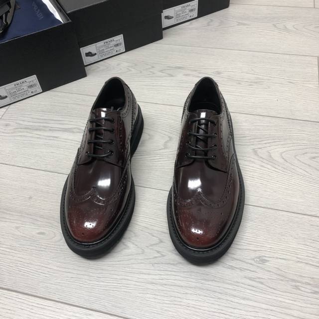 Carved Prad* Derby men's shoes have arrived. Counter quality, hand-rubbed color