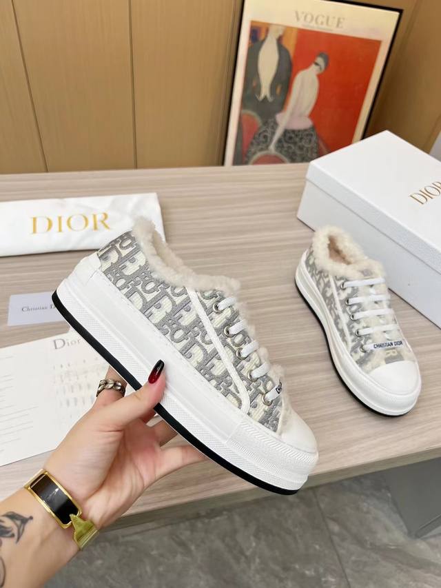 New Dior model. Made from imported Italian fabric! Features an embroidered uppe