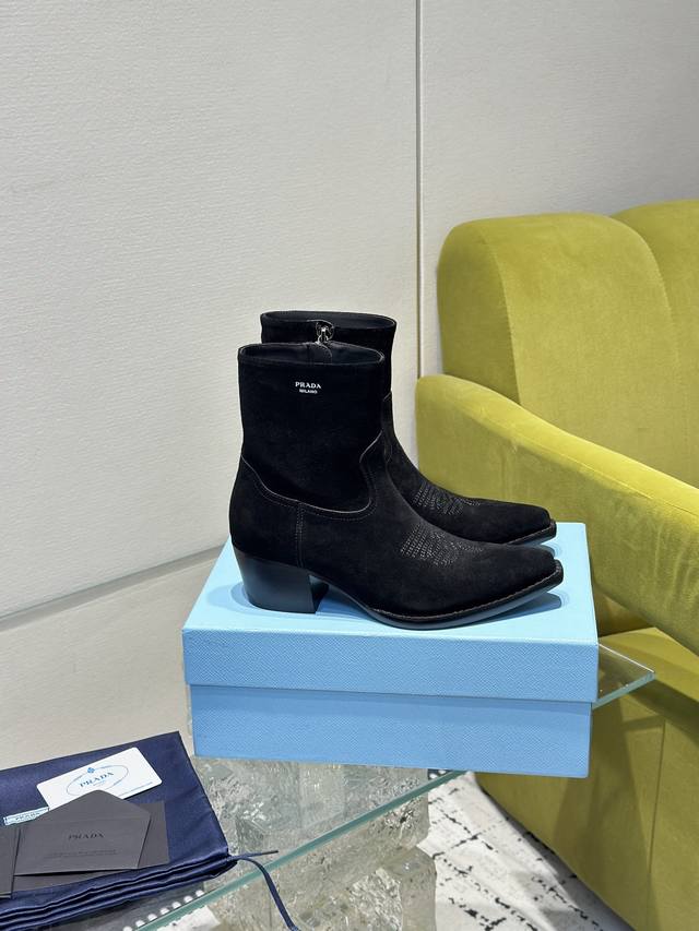 A luxurious version of the classic Prada pointed-toe boots, perfect for importa