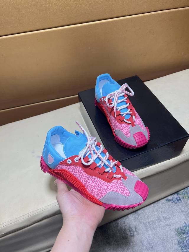Exclusive debut of Dolce & Gabbana's unique, modern sneakers. Purchased from th