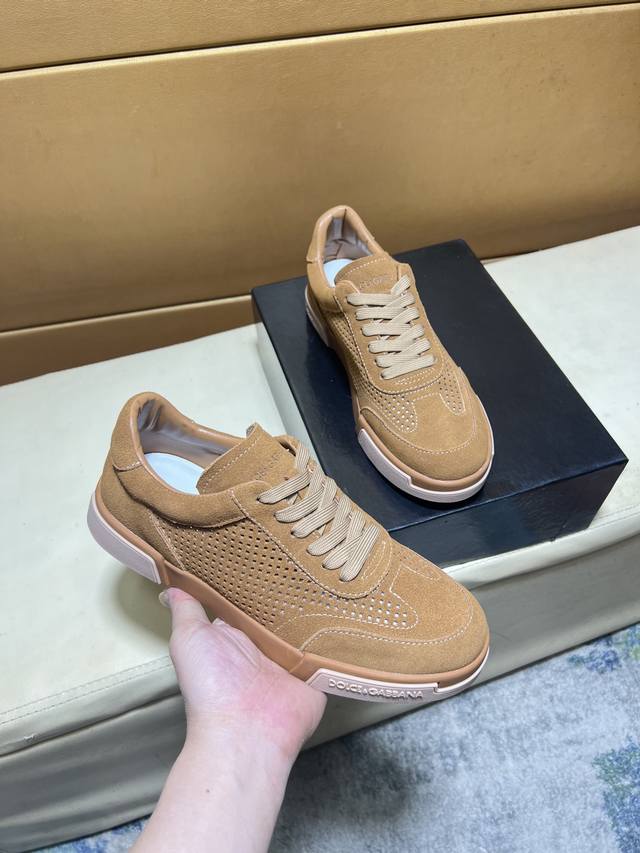 Exclusive debut of Dolce & Gabbana's unique, modern sneakers. Purchased from th