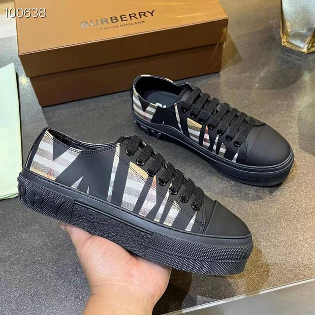 counter. These Burberry retro plaid cotton sneakers are 5D printed with a contr