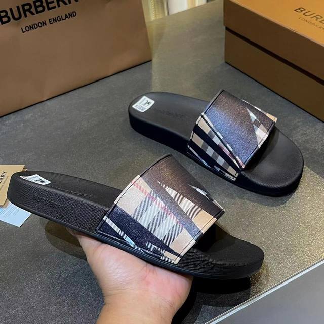 The new slippers are adorned with the brand's three-dimensional monogram logo a