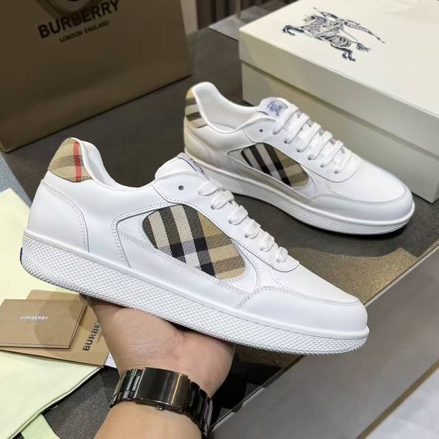 Top Edition This Italian-made sneaker is crafted from smooth calfskin leather w