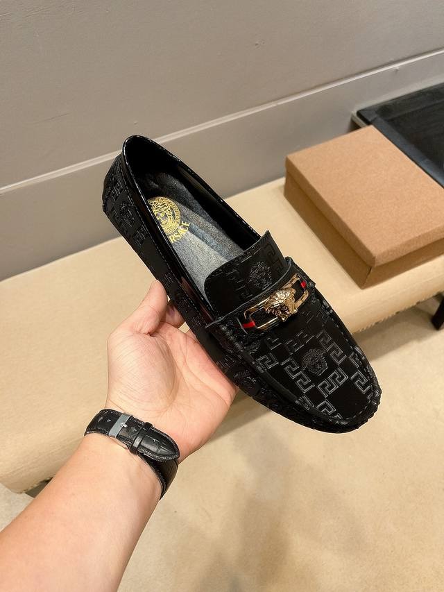 Versace high-end slip-on sneakers, available now at the official Versace counter
