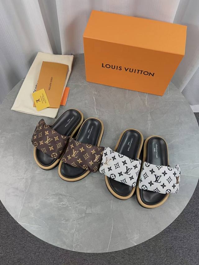 Lv's popular embossed logo sandals. These Pool Pillow Comfort flat sandals are c