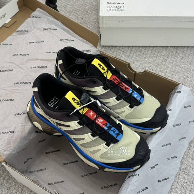 Couple's pair. Salomon and Margiela collaborate on the X-Alp series, a couple's