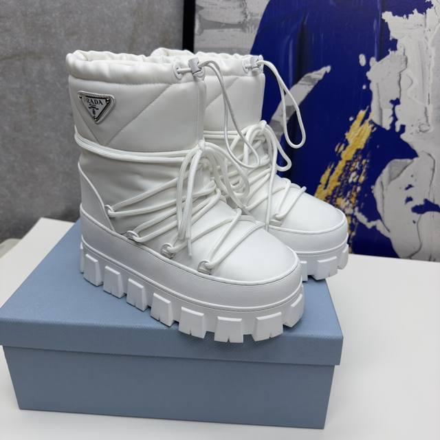 Prada's ultimate snow and ski boots are incredibly cute and chunky. From the Pra