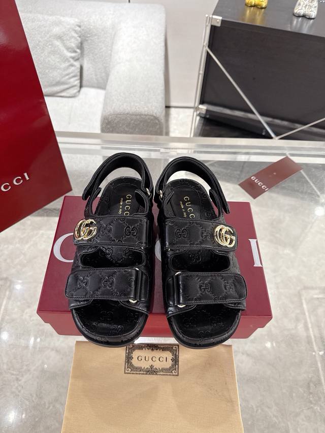 Gucci Women's Embossed Gg Sandals. These sandals are expertly crafted from Gg le