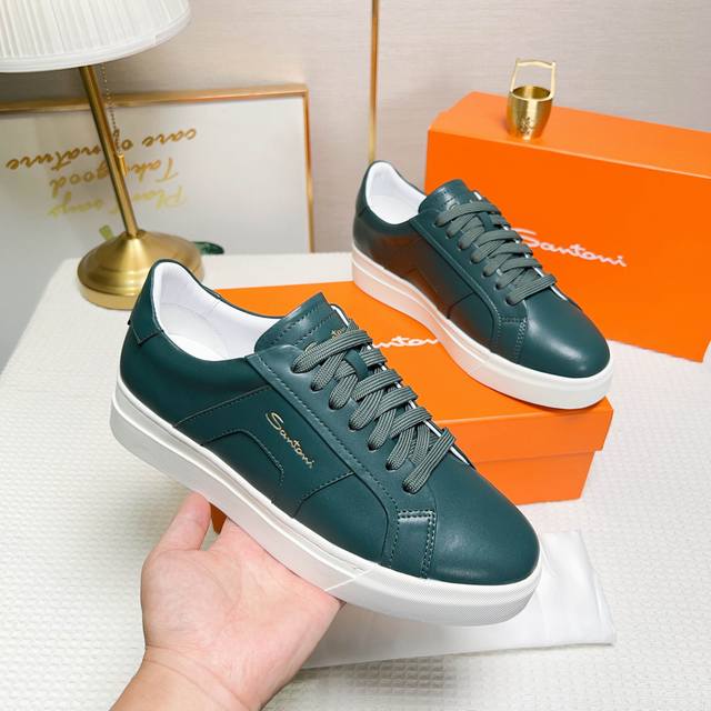Santoni This is a low-top sports shoe with a unique design and distinctive style