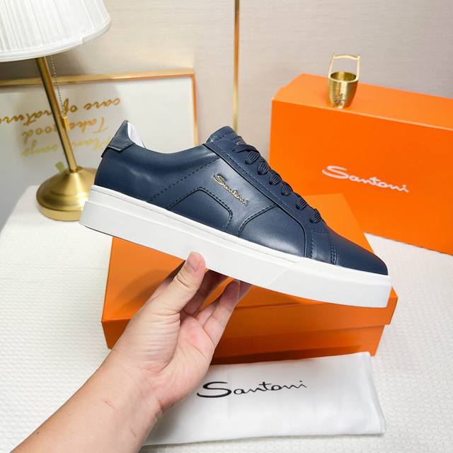 Santoni This is a low-top sports shoe with a unique design and distinctive style