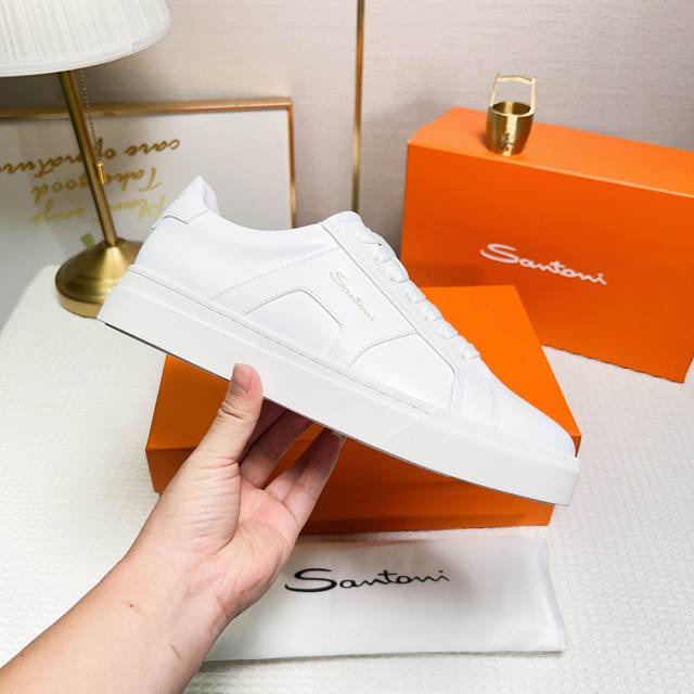 Santoni This is a low-top sports shoe with a unique design and distinctive style