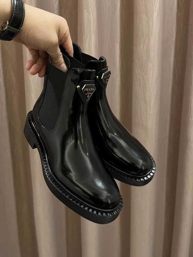 Prada's top-of-the-line motorcycle boots are here. They're super stylish, comfor