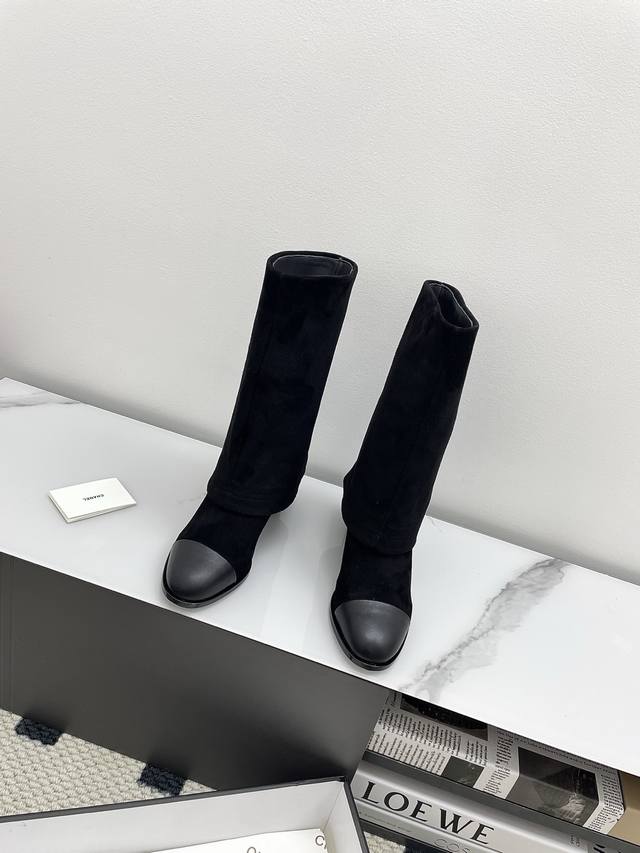 Chanel's new Fall/Winter 2025 colorblocked block-heeled trouser-leg boots (DDD)
